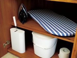 a shelf with two toilets on it with a pillow at CHULAX OKINAWA YOMITAN【Designer Condominium Hotel】 in Yomitan