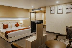 Regenta Central Somnath, Bhalpara客房内的一张或多张床位