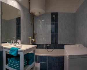 Kúpeľňa v ubytovaní Silentium City Apartman Sárvár