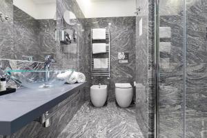 Koupelna v ubytování Aiello Rooms - San Babila