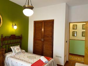 Posteľ alebo postele v izbe v ubytovaní Casa de Campo con Piscina en Sevilla en los Palacios y Villafranca