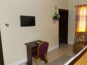 TV a/nebo společenská místnost v ubytování Nest Spa And Suites - Standard Executive
