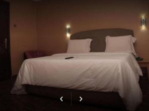 Postel nebo postele na pokoji v ubytování Nest Spa And Suites - Standard Executive
