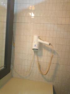 Ένα μπάνιο στο Room in Lodge - All Seasons Hotel-apartment
