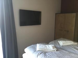 Postel nebo postele na pokoji v ubytování Slaperij Salud! Studios & appartementen