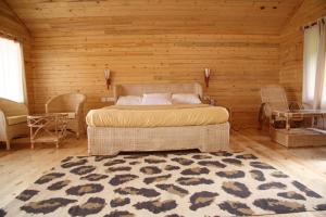 Postel nebo postele na pokoji v ubytování Surya Holidays Kodaikanal