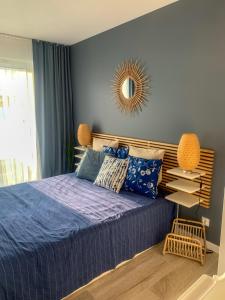 Posteľ alebo postele v izbe v ubytovaní La Riva Mia Apartamenty