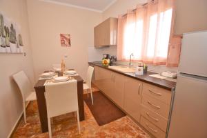 Kuchyň nebo kuchyňský kout v ubytování Casa D' Oro Corfu