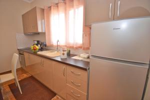 Kuchyň nebo kuchyňský kout v ubytování Casa D' Oro Corfu