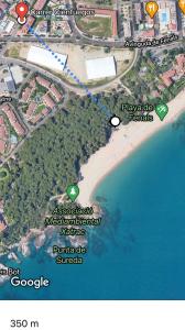 a map of a beach next to the water at SeaHomes Vacations, FENALS BEACH&CHIC, pk, top apartment full equipped in Lloret de Mar