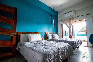 Postel nebo postele na pokoji v ubytování isel magic hotel