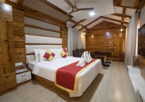Cama ou camas em um quarto em SR Jungle Resort