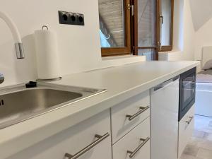 Kuchyňa alebo kuchynka v ubytovaní Vár-Lak Apartman