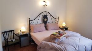 A bed or beds in a room at Casa Michelle "Natura e Relax"