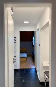 Posteľ alebo postele v izbe v ubytovaní Vár-Lak Apartman