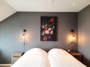 Cama o camas de una habitación en Hof van Renesse