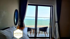 Giường trong phòng chung tại TMS Quy Nhơn Luxury Homestay