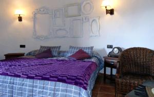 Cama o camas de una habitación en Casas Rurales Lagunas de Ruidera - Piscina