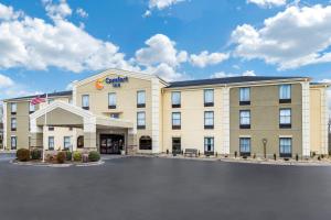 a rendering of the front of a hotel with a parking lot at Comfort Inn Asheville Airport in Fletcher