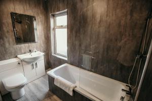 Koupelna v ubytování PARKER St by Prestige Properties SA
