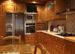 A kitchen or kitchenette at Casal Pedrajás