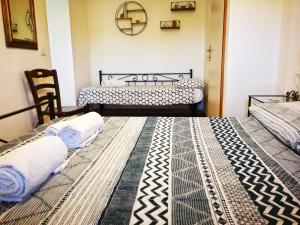 Кровать или кровати в номере Bed & Bike Casa dei Papi