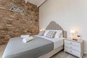 Postel nebo postele na pokoji v ubytování Almiriki Naxos Beachside Living