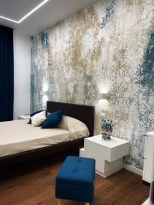 Postel nebo postele na pokoji v ubytování Fervore Luxury Rooms
