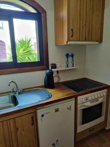 Kuchyň nebo kuchyňský kout v ubytování TAGORO PARK Apartament by lAmOnDaos