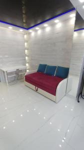 a room with a bed and a table in it at 1к в Новом доме рядом с Шалимова, ISIDA, НАУ, Космополитан, метро Шулявская. Большевик. ДК Росток. Отрадный парк. Национальный Авиационный Университет in Kyiv +67 photos