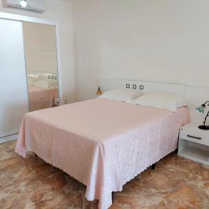 Postel nebo postele na pokoji v ubytování Pousada del Sole