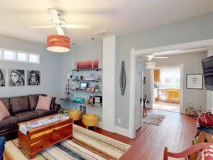 a living room with a couch and a table at The Blue Bungalow in Montrose