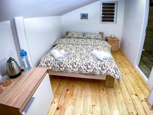 Postel nebo postele na pokoji v ubytování Kiko apartmani