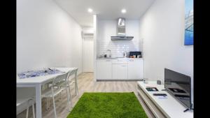 Kuchyň nebo kuchyňský kout v ubytování City Heart Place 2