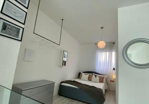 Posteľ alebo postele v izbe v ubytovaní Scalabrini LOFT