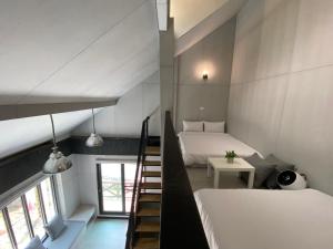 Cama o camas de una habitación en Evi Bnb