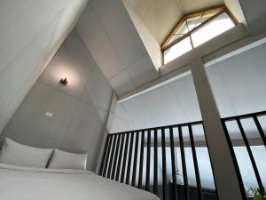Cama o camas de una habitación en Evi Bnb