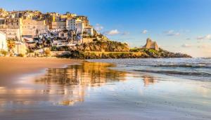 a view of a beach with a resort at Casa Noemi in Sperlonga