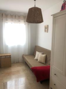 Posedenie v ubytovaní Apartamento con terraza y piscina en Malgrat de Mar