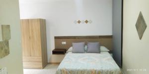 Un pat sau paturi într-o cameră la CASA LOS PATOS