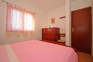 Postelja oz. postelje v sobi nastanitve Žigulin Apartment