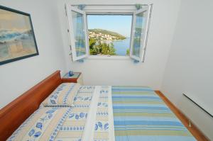 Postelja oz. postelje v sobi nastanitve Žigulin Apartment