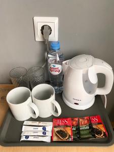 Kavos ir arbatos ruošimo rinkinys apgyvendinimo įstaigoje Sunpark Hotel
