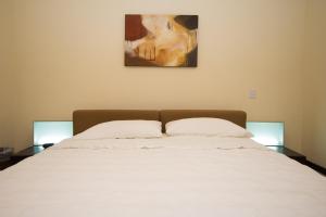 Cama o camas de una habitación en Apartment with Pool View - Tendenzza 101