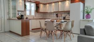Η κουζίνα ή μικρή κουζίνα στο Olea Holiday Estate