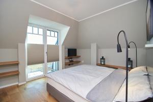 Ein Bett oder Betten in einem Zimmer der Unterkunft Julie´s Home (Penthouse)