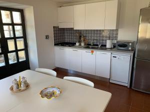 Küche/Küchenzeile in der Unterkunft L'edicola di Ripalvella