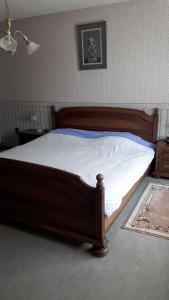 Ein Bett oder Betten in einem Zimmer der Unterkunft Karl et Marie