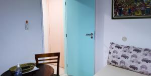 En eller flere senge i et værelse på Karina Estudio