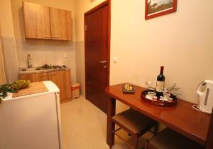 Kuchyň nebo kuchyňský kout v ubytování Guest House Villa Pastrovka
